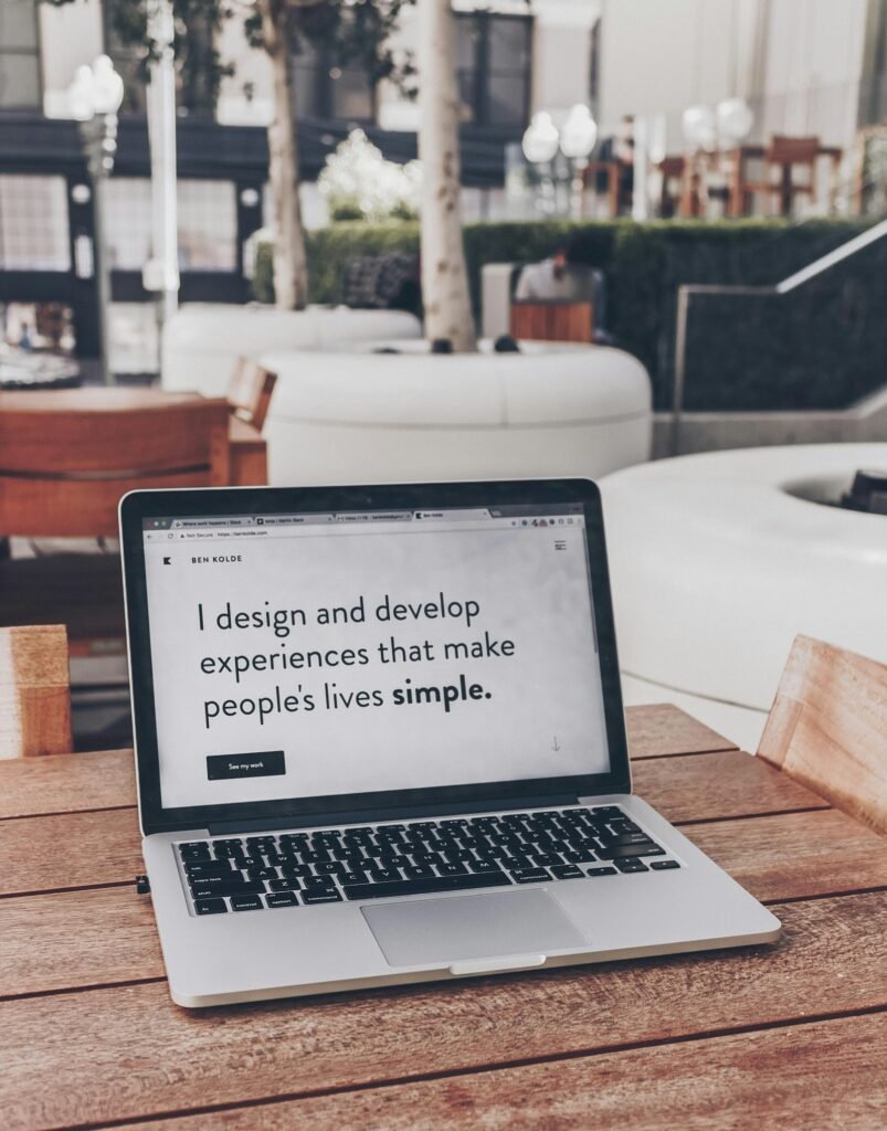 Designer workspace with a laptop for website design